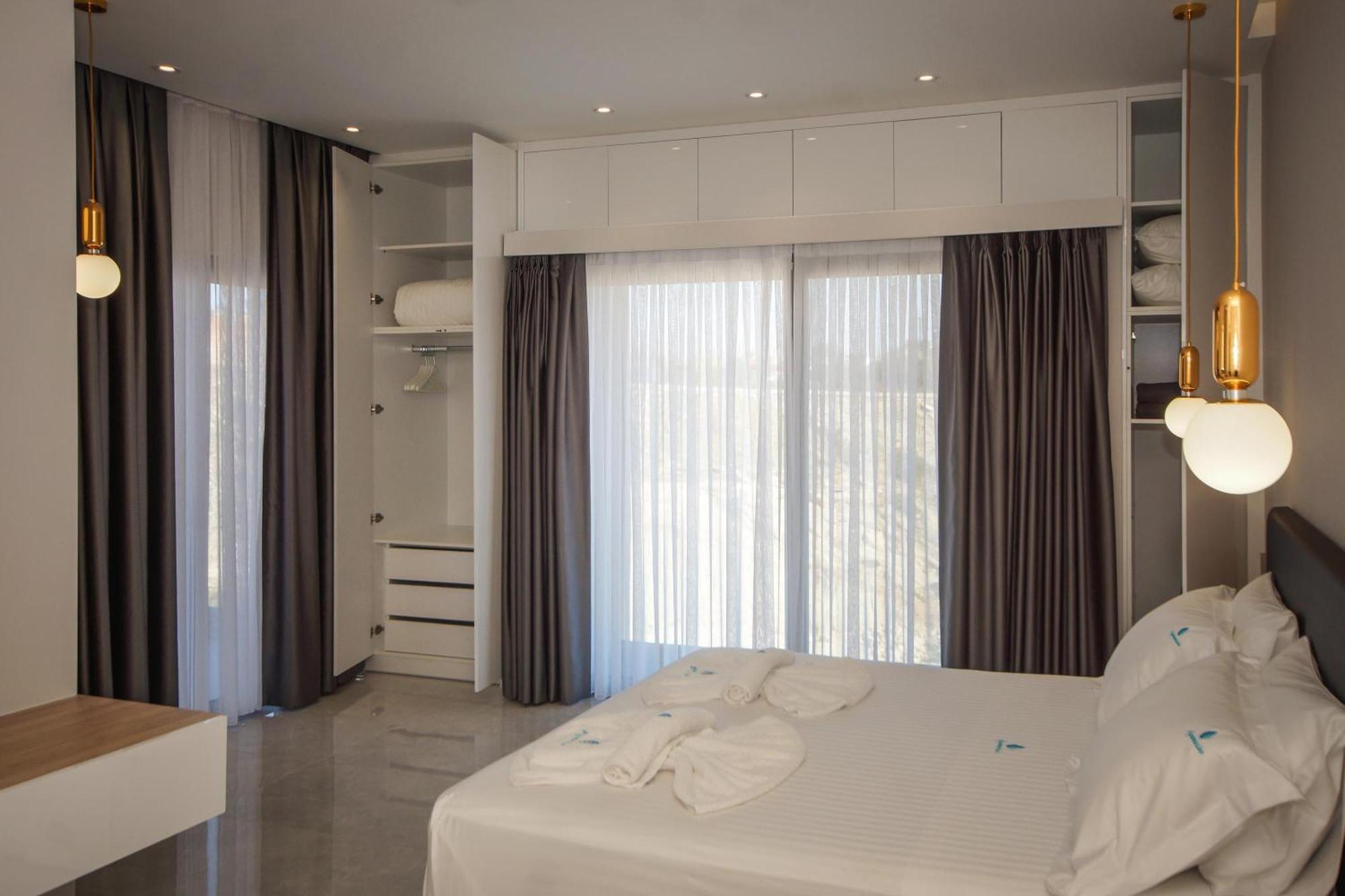 Aquamarine Luxury Suites Archangelos  Buitenkant foto